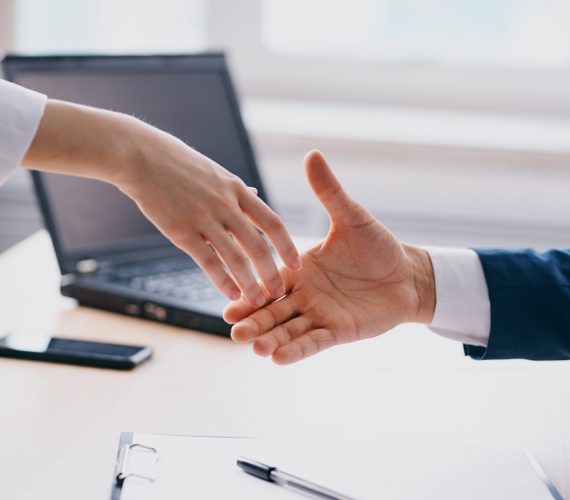 business people shake hands at work in the office 2026 01 09 00 29 10 utc